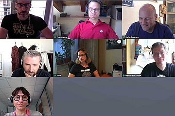 Screenshot of an online meeting with seven members