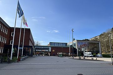 Brick houses surrounding an open square. One entrance says "Chalmers" in all uppercase letters.