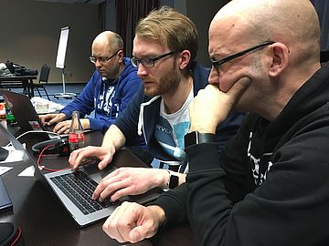 Thomas Löffler, Michel Loew, and Harry Glatz at a sprint organized by the typo3.org team.
