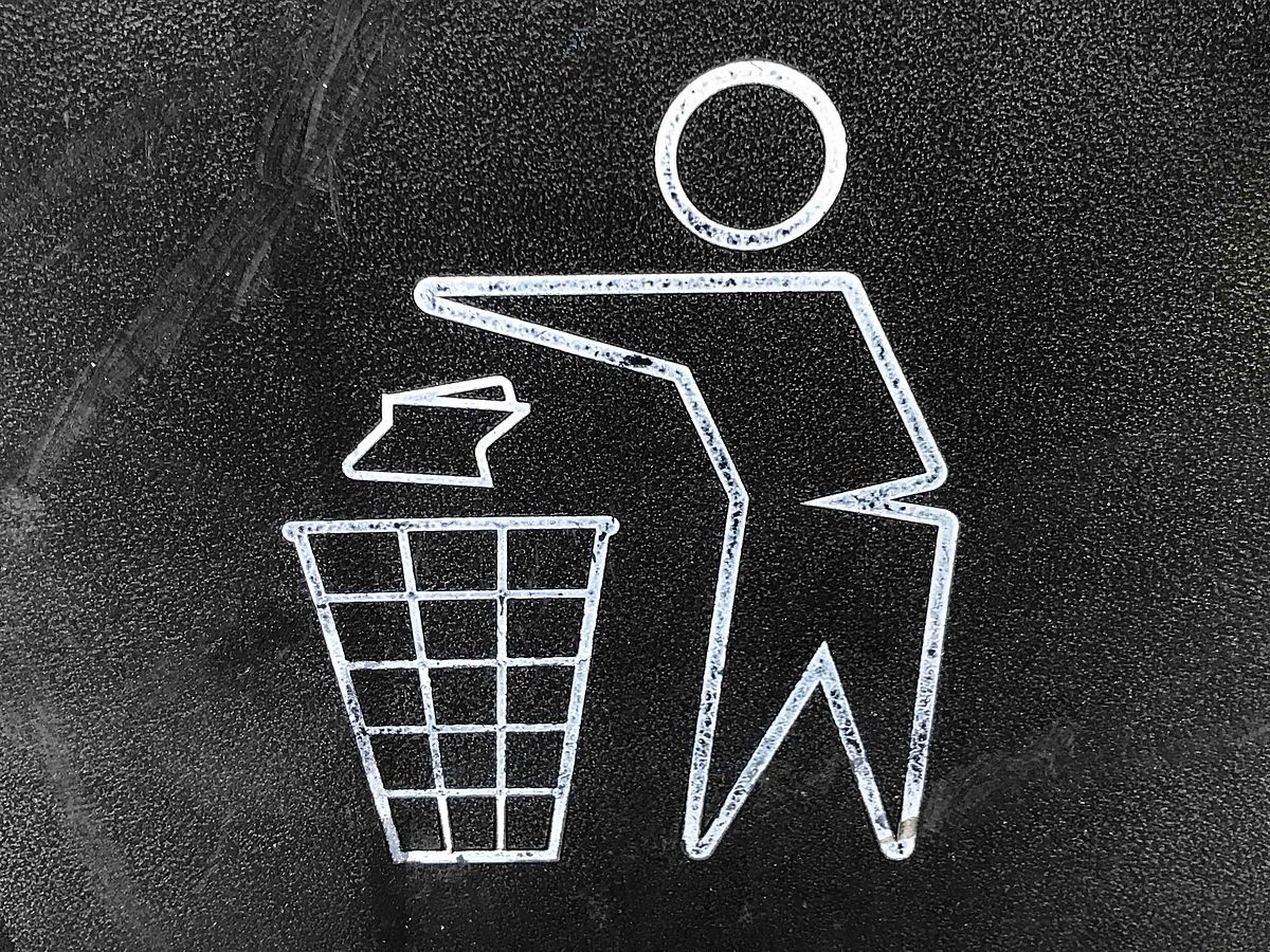 Close up of a recycle garbage bin logo