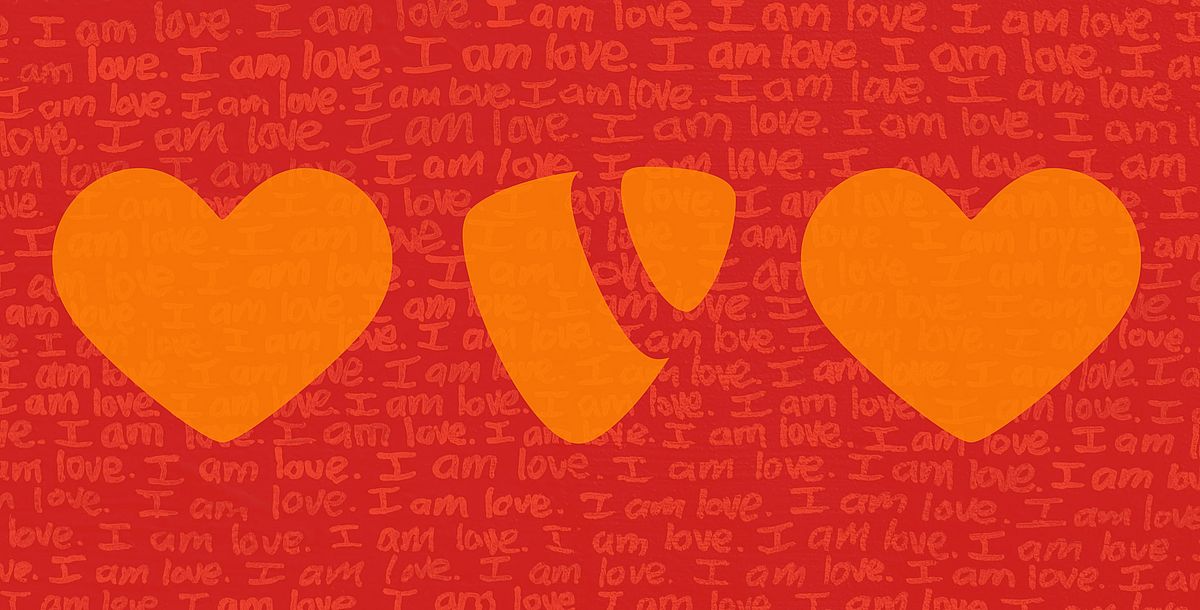 The text "I am love" with two hearts and the TYPO3 logo superimposed.