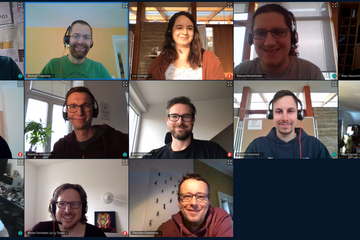 Screenshot of an online meeting with 13 participants.